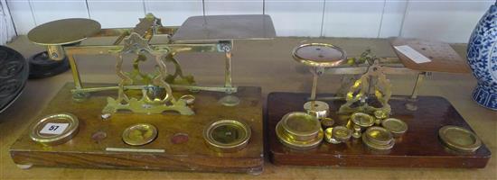 Postage scales and a smaller similar set
